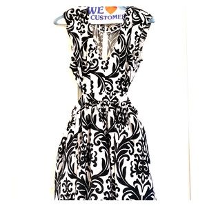 Black and white party dress w/ cutouts on sides